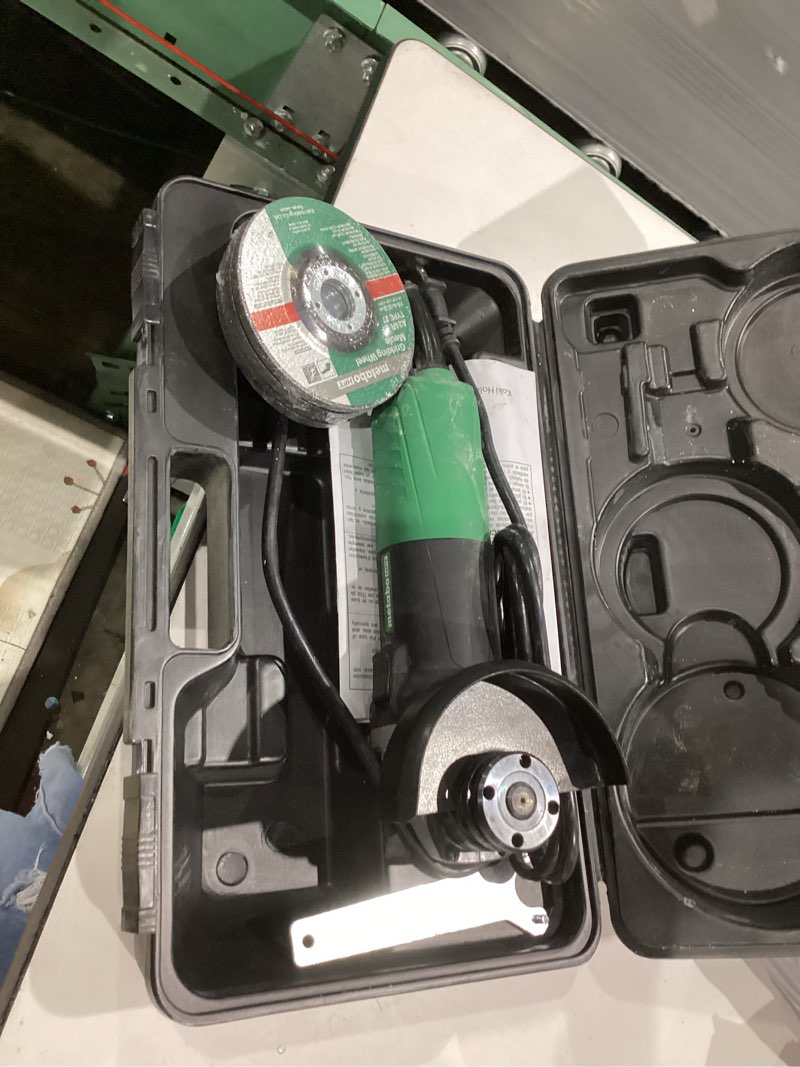Condition photo showing As Is for metabo hpt 4.5-in 6.2 amps sliding switch corded angle grinder (charger not incldued)