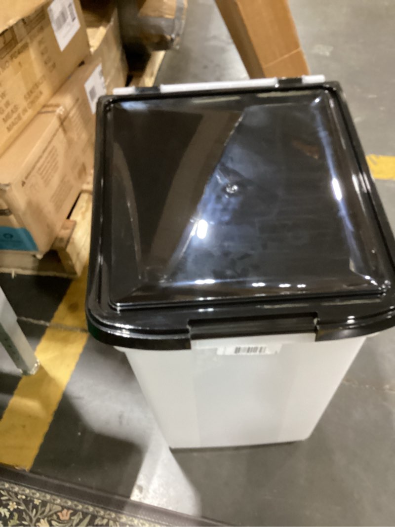 Condition photo showing Good Condition for iris usa airtight dog food storage container, weatherpro, up to 50 lbs, removable wheels, for dog cat bird and other pet food storage bin, keep fresh, translucent body, made in usa, clear/black 50 lbs black