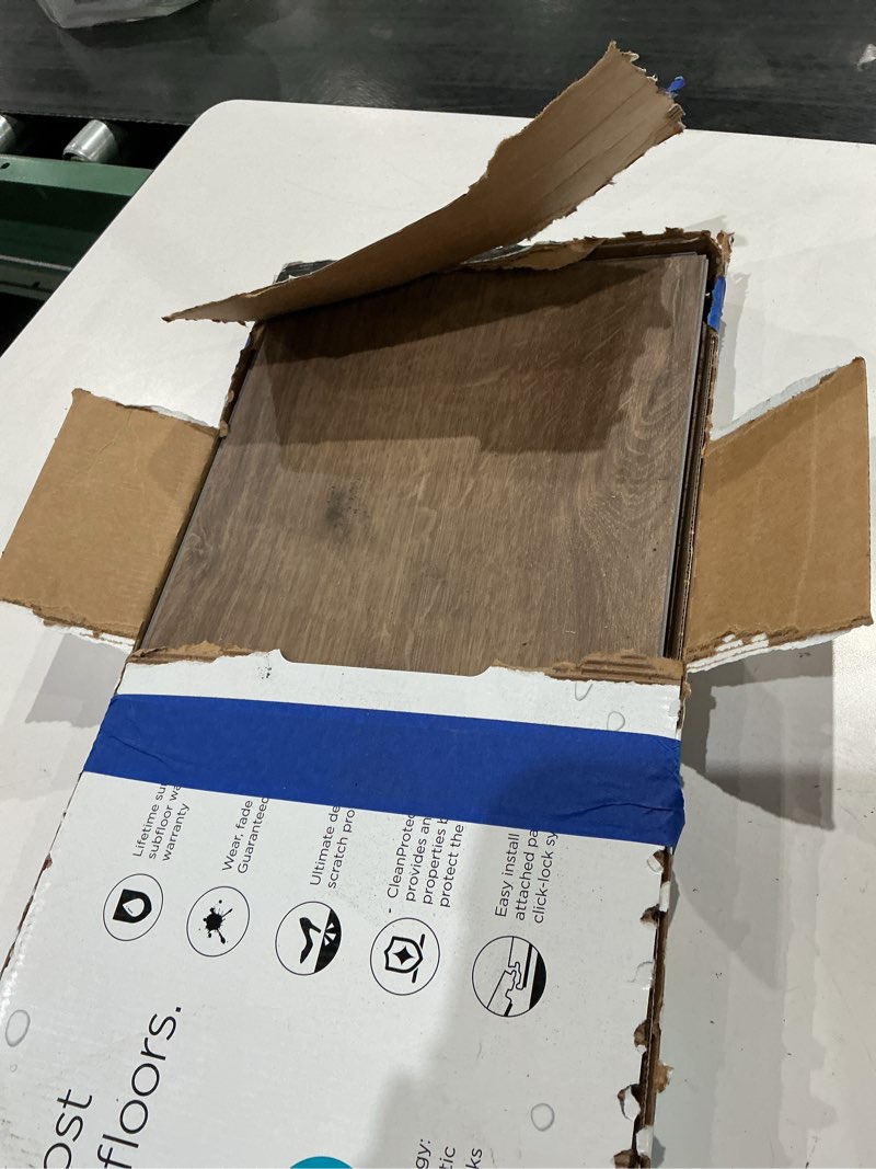 Condition photo showing As Is for pergo duracraft seville oak brown 22-mil x 9-1/2-in w x 47-in l waterproof interlocking luxury vinyl plank flooring (18.78-sq ft/ carton)