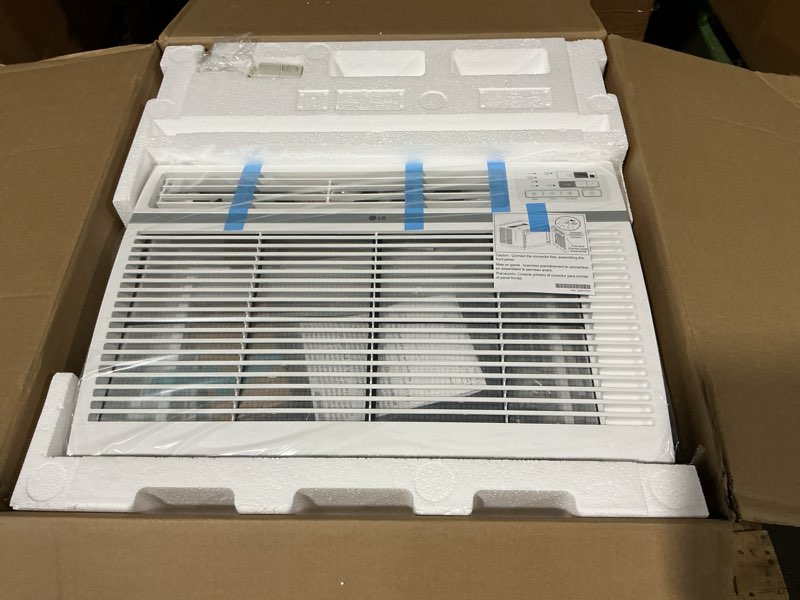Condition photo showing Good Condition for 18,000 btu 208/230v window air conditioner cools 1,000 sq. ft. with remote in white