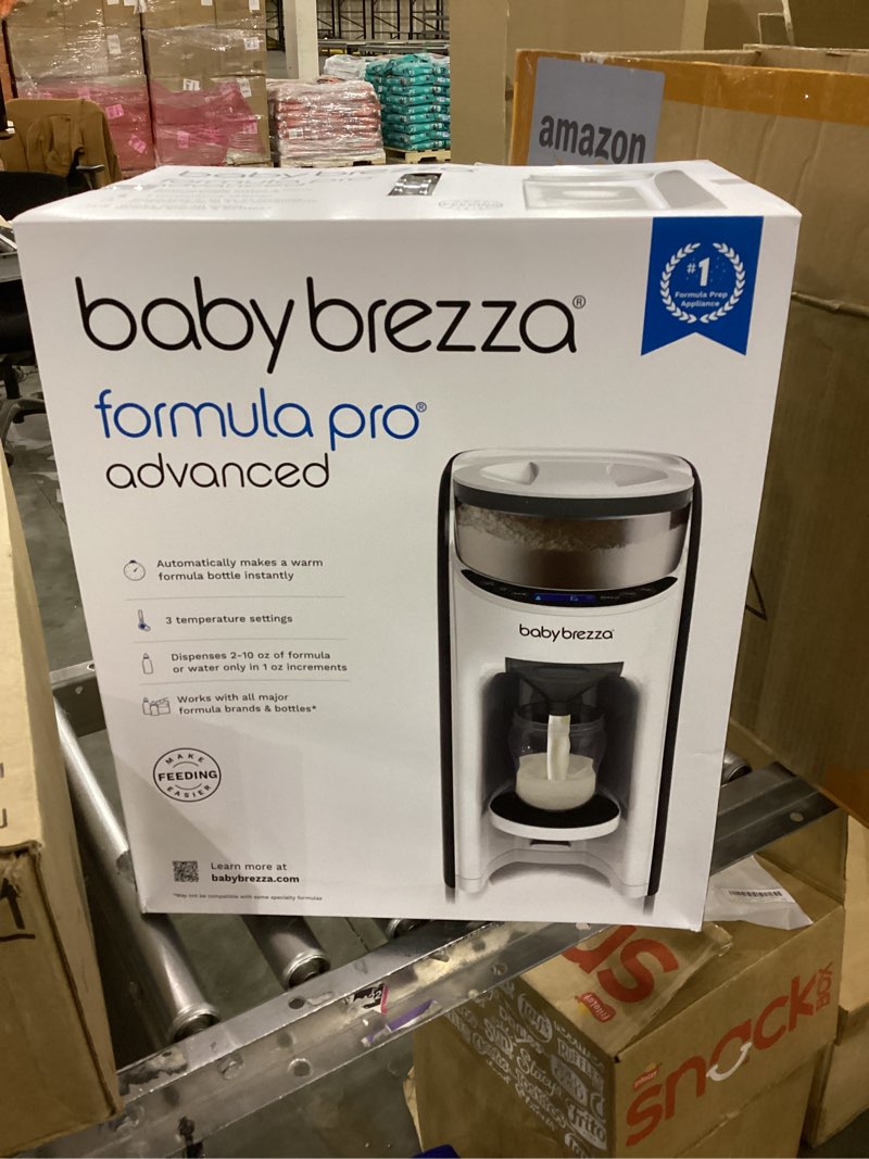 Condition photo showing New/Like New for Baby Brezza New and Improved Formula Pro Advanced Formula Dispenser Machine - Automatically Mix a Warm Formula Bottle Instantly - Easily Make Bottle with Automatic Powder Blending, White