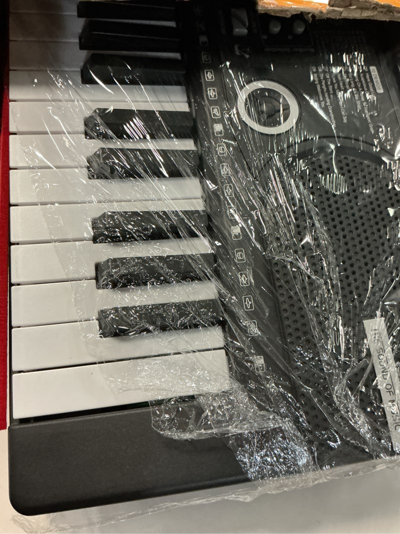 Condition photo showing Good Condition for 61 keys keyboard piano, Electronic Digital Piano with Built-In Speaker Microphone, Sheet Stand and Power Supply, Portable piano Keyboard Gift Teaching for Beginners Black