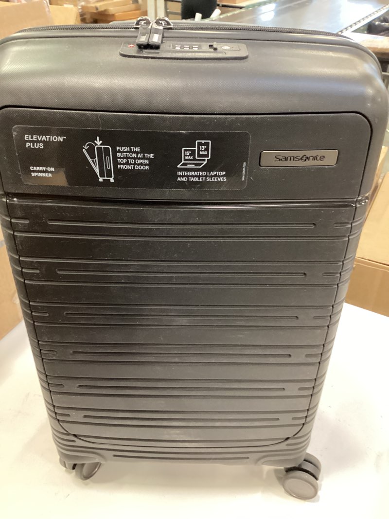 Condition photo showing As Is for Samsonite Elevation Plus - Carry-On Hardside Luggage with QuickEntry™ Front Compartment - Scratch Resistant Polypropylene Shell, AirTag Holder, TSA Lock, Airline Approved - Triple Black Carry-On PRO Triple Black