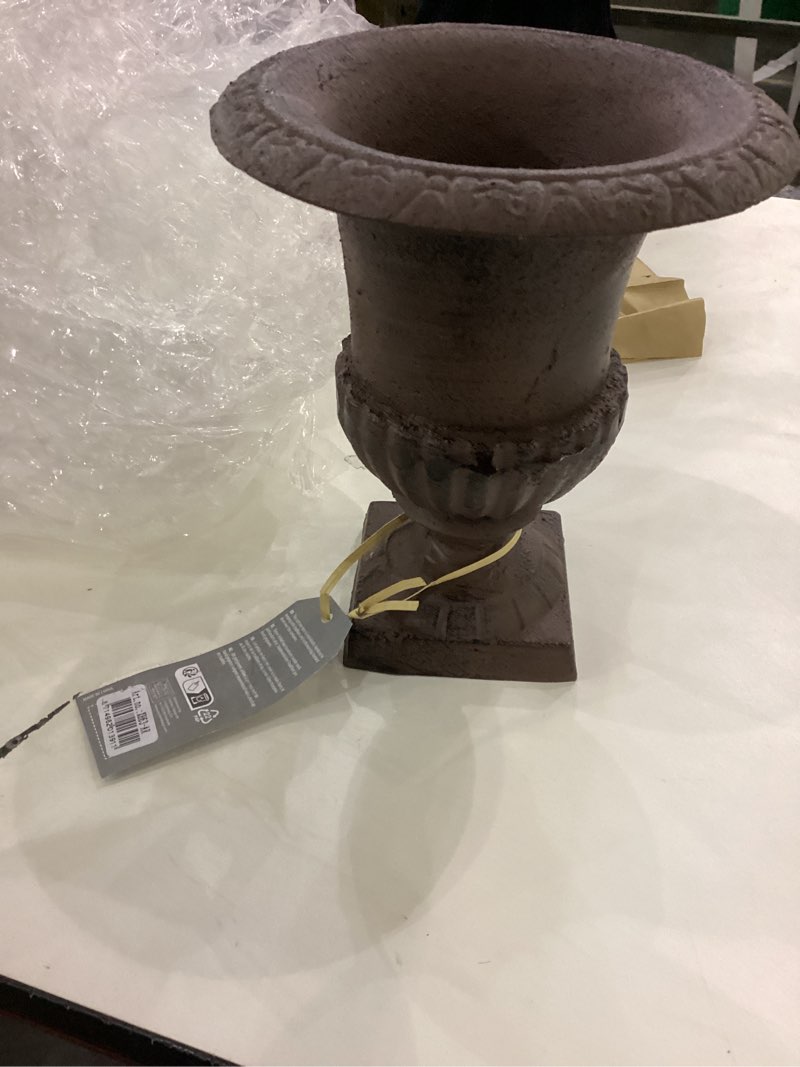 This is an Esschert Design cast iron French urn planter with an antique brown finish.  