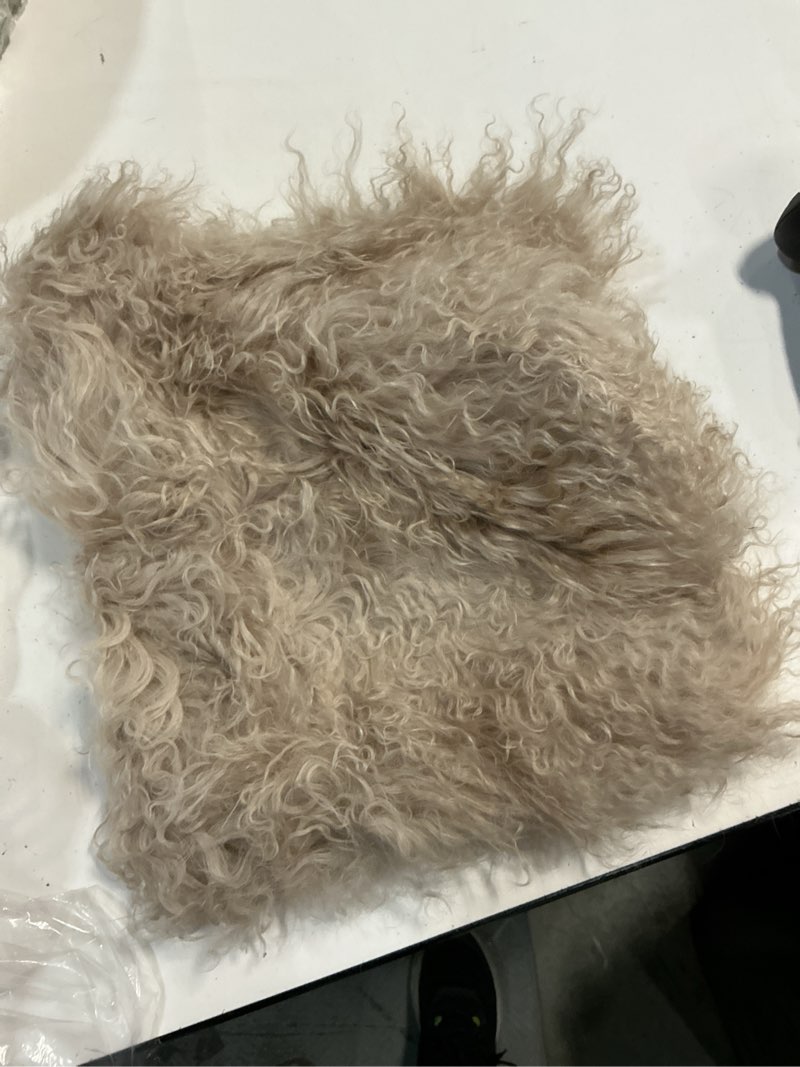 Condition photo showing As Is for quince luxe mongolian lamb lumbar pillow cover, 12x20, khaki