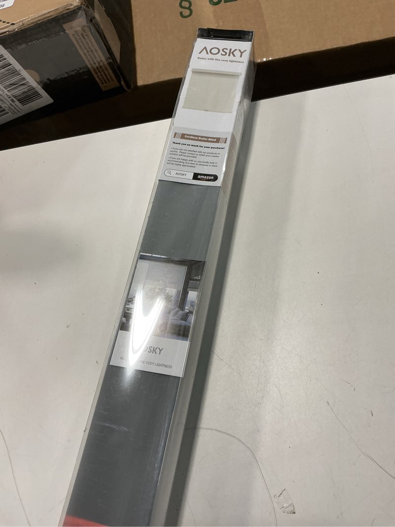 Condition photo showing Good Condition for AOSKY Light Filtering Roller Shades Cordless Blinds for Windows, Free-Stop Shades with Valance, 99% Blackout, Thermal Insulated Fabric, UV Protection, Natural Woven Blinds?36" W x 72" H, Black? Black 36"W x 72"H