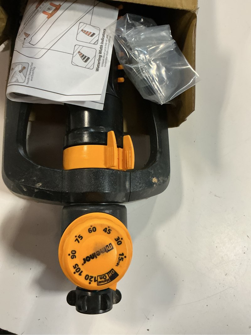Condition photo showing As Is for melnor 65133amz xt turbo oscillating sprinkler w/timer, 4,000 sq. ft., quick connect bundle, 2-way adjustable, black, yellow 2-way adjustable with timer