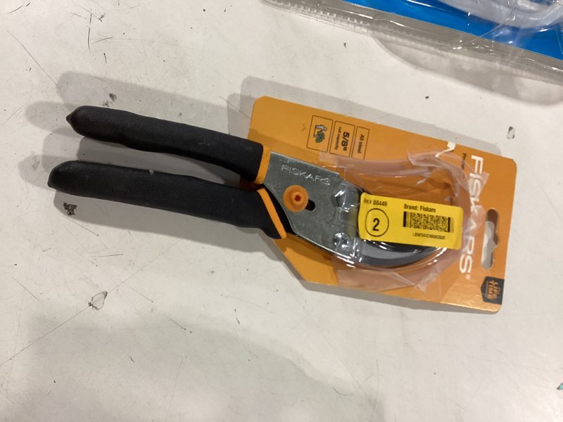 Condition photo showing As Is for fiskars bypass pruning shears, 5/8" cut capacity gardening scissors, self-cleaning sap groove prevents sticking, non-slip grip for cutting stems & branches, sharp steel blades w/ low-friction coating bypass pruner