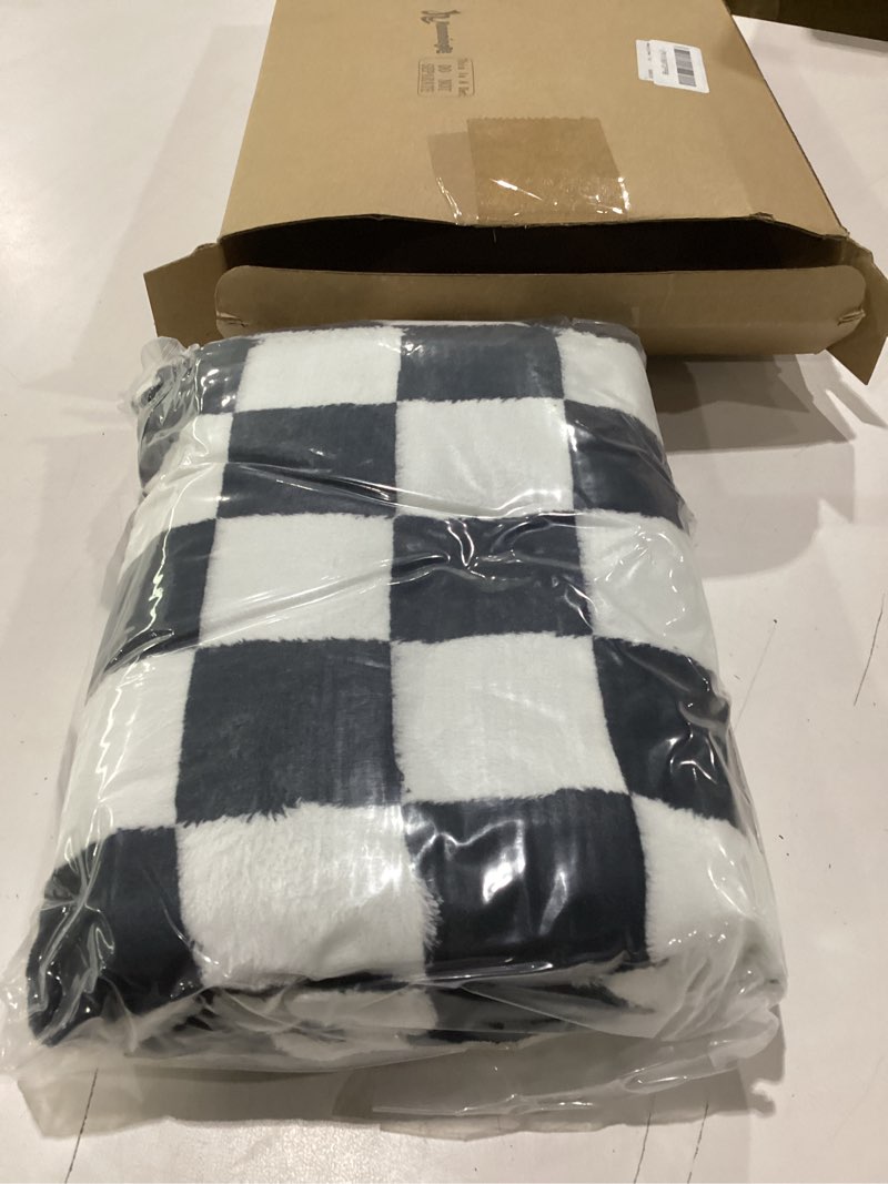 Condition photo showing New/Like New for 5 pcs travel pillow and blanket set, 5 in 1 travel airplane compact includes 40 x 60 inch throw blanket eye mask neck pillow earplug and bag gifts for travelers women(checkered,black) checkered black