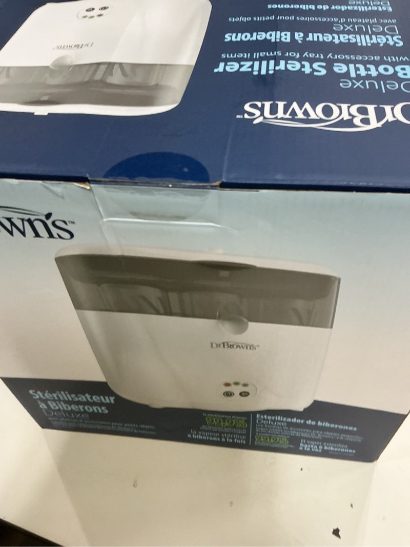 Condition photo showing New/Like New for dr. brown’s deluxe electric sterilizer for baby bottles and other baby essentials