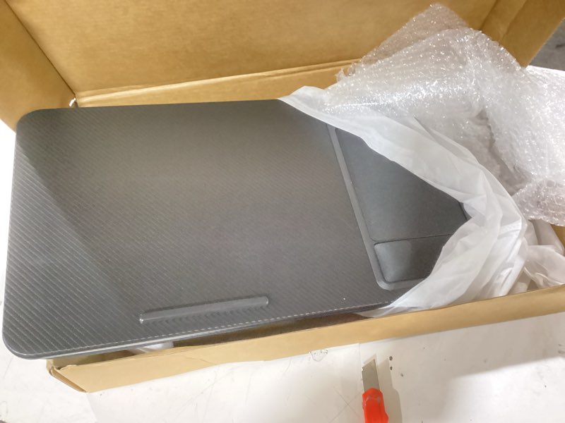 Condition photo showing Good Condition for LAPGEAR Large Adjustable Lap Desk with Memory Foam Wrist Rest, Mouse Pad, Phone Holder, Device Ledge, and Booster Cushion - Black Carbon - Fits up to 15.6 Inch Laptops - Style No. 88008