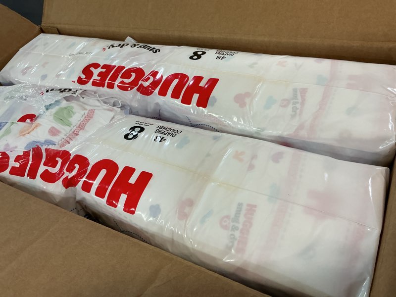 Condition photo showing New/Like New for huggies snug & dry disposable diapers - econ+ pack - size 8 - 96ct