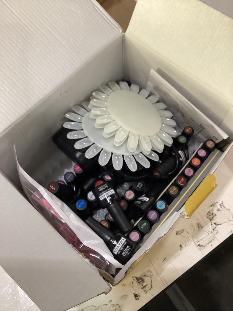 Condition photo showing Good Condition for VANREESA Gel Nail Polish Kit with U V Light 74 Pcs Gel Polish Nail Set 56 All Seasons Colors Nail Polish Set + Base and 4 Effects Top Coat with Manicure Tools Complete Nail Kit Gifts for Women All Colors You Want
