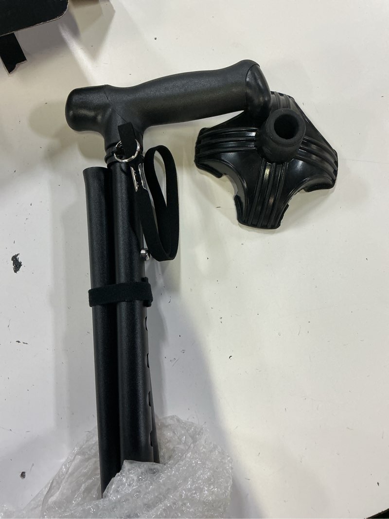 Condition photo showing Good Condition for tall men's walking cane,1.43 lb, 15.75" folded,over 5'9",black | 42.52" extended.no stooping,free standing,longer thicker grip,stable base,foldable, adjustable height, 300 lbs capacity plus lengthened black cane(35.43-42.52in)