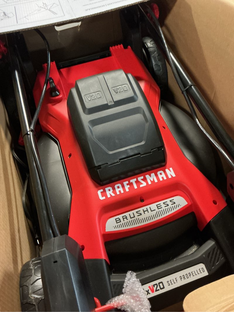 Condition photo showing As Is for craftsman v20 2x20v cmcmwsp220p2 20 in. battery self-propelled lawn mower kit (battery & charger)