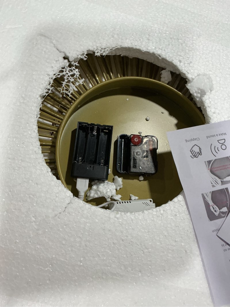 Condition photo showing As Is for 27" Gold Mid Century Modern Wall Clock?Battery Operated Decorative Decorative Metal Wall Clock for Living Room/Bedroom/Office/Bathroom Wall Art&Clocks 27inch