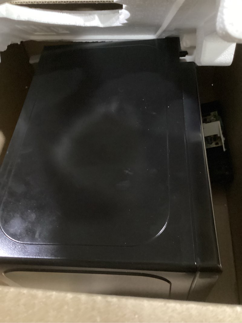 Condition photo showing Good Condition for black+decker em720cb7 digital microwave oven with turntable push-button door, child safety lock, 700w, stainless steel, 0.7 cu.ft 0.7 cu. ft.