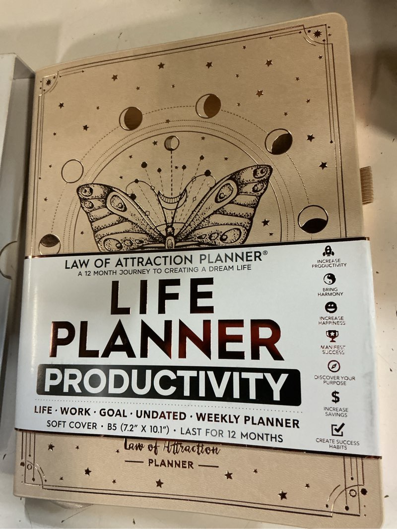 Condition photo showing New/Like New for life planner deluxe undated planner weekly and monthly manifestiing journal | start anytime manifestation journal with hourly scheduling, goal setting, positivite habit tracker, vision board & stickers vanilla butterfly b5 18.29 x 25.65 cm