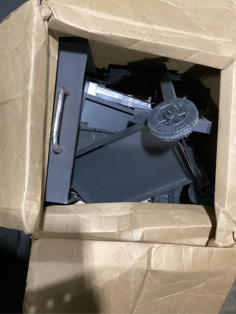 Condition photo showing As Is for unnamed small grill with wheels