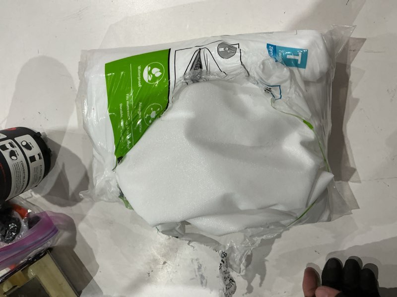 Condition photo showing As Is for mainstays nexgen waterproof anti-allergen zippered mattress protector, twin