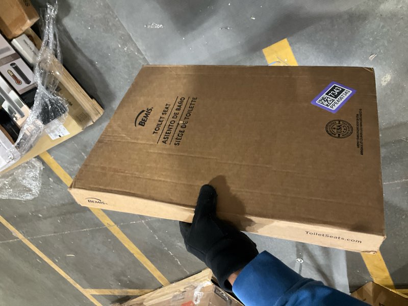 Condition photo showing New/Like New for Bemis Elongated Enameled Wood Toilet Seat in Biscuit with Easy•Clean? Hinge