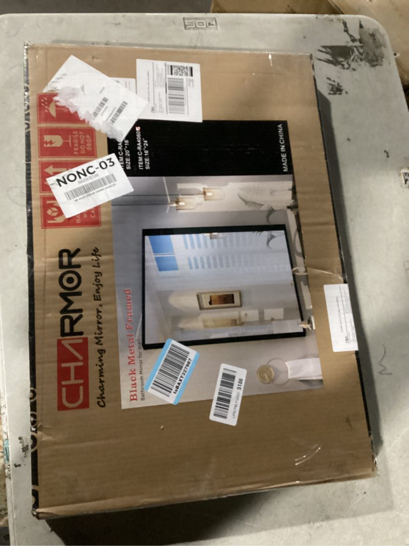 Condition photo showing Good Condition for 16x24 inch black metal framed bathrrom mirror for wall, matte black rectabgle mirror, rounded corner, anti-rust, hangs horizontally or vertically 24"l x 16"w black
