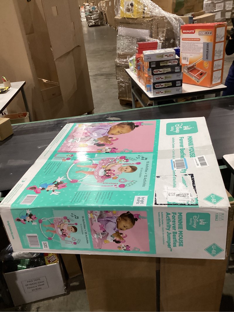 Condition photo showing New/Like New for Bright Starts Disney Baby Minnie Mouse Forever Besties Baby Activity Center Jumper with 10 Toys, Lights & Sounds, 360-Degree Seat, 6-12 Months (Pink)