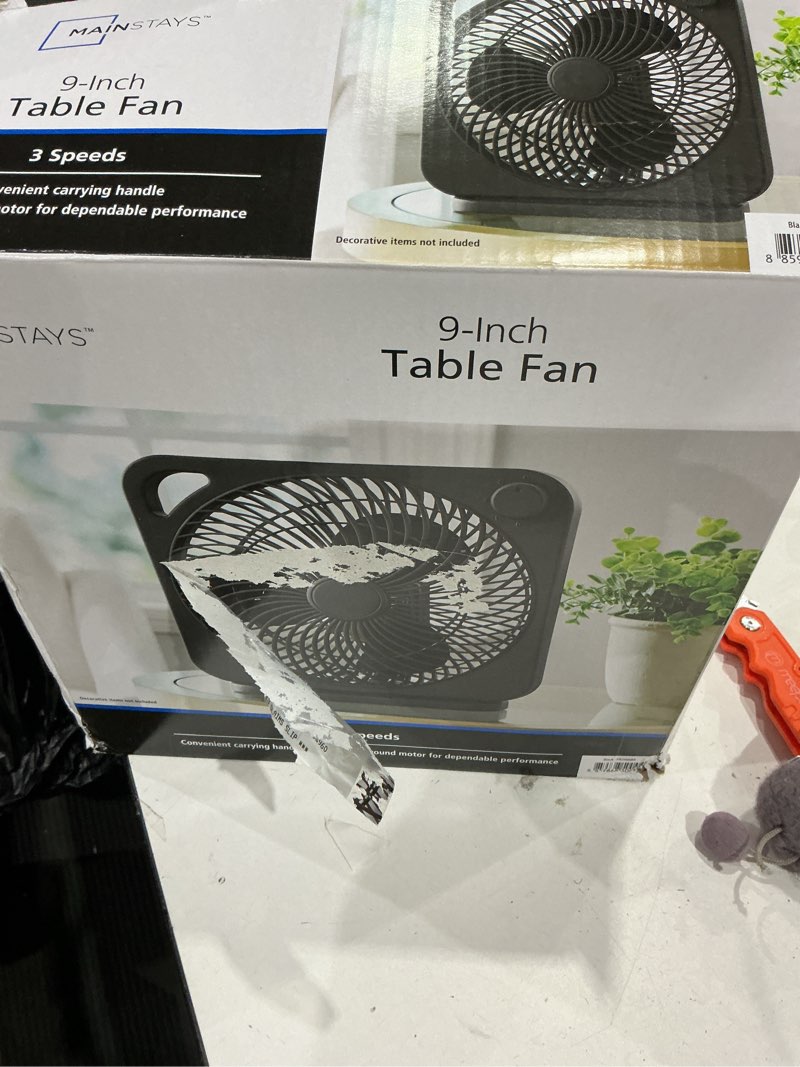 Condition photo showing As Is for mainstays 9" 3-speed indoor personal table electric fan, portable handle, black