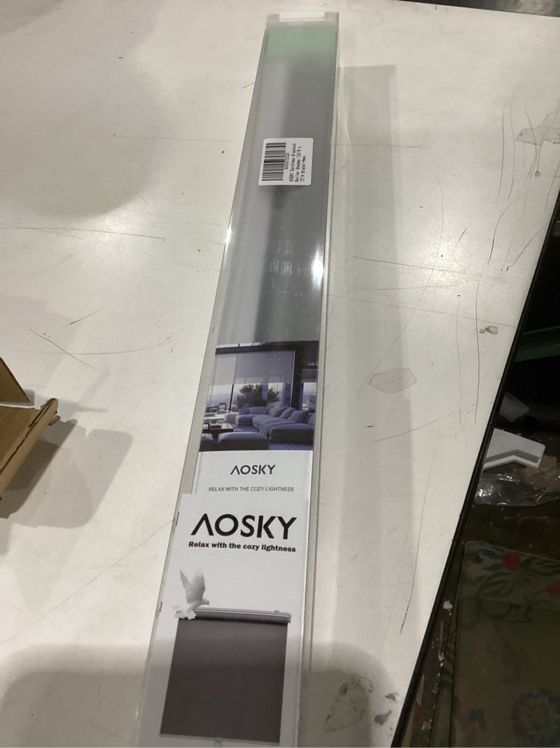 Condition photo showing New/Like New for AOSKY Cordless Roller Shades Blackout Blinds for Windows Room Darkening Rolled Up Shades with Spring System, UV Protection Window Shades Door Blinds for Home and Office (26" W x 72" H, Black) 26"W x 72"H Black