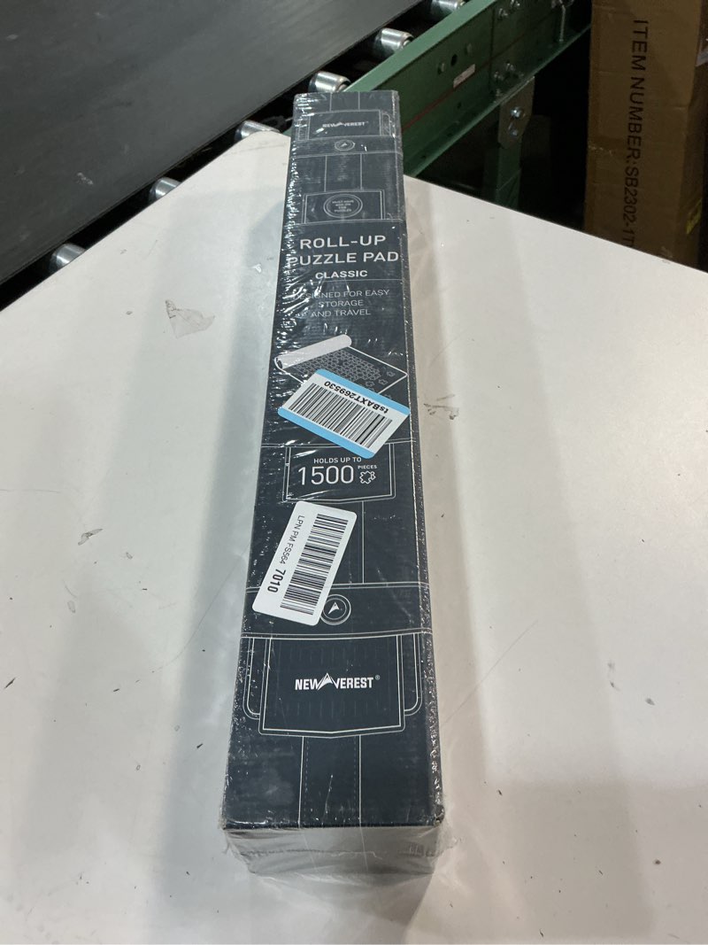 Condition photo showing New/Like New for The Original Newverest Jigsaw Puzzle Mat Roll Up, Saver Pad 46” x 26” Portable Keeper Up to 1500 Pieces with Non-Slip Rubber Bottom & Smooth Top + 3 Puzzle Sorting Trays & Travel-Friendly Storage Bag 1500pcs