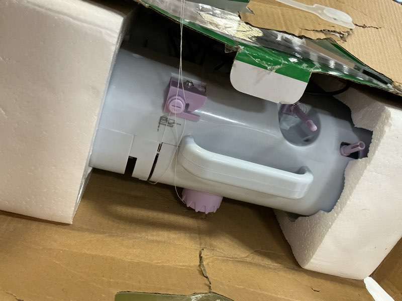 Condition photo showing As Is for sewing machine for beginners, portable mini small sewing machine with 50 pcs fabric and 32 pcs sewing threads kit, 12 built-in stitches 2 speed with foot pedal purple