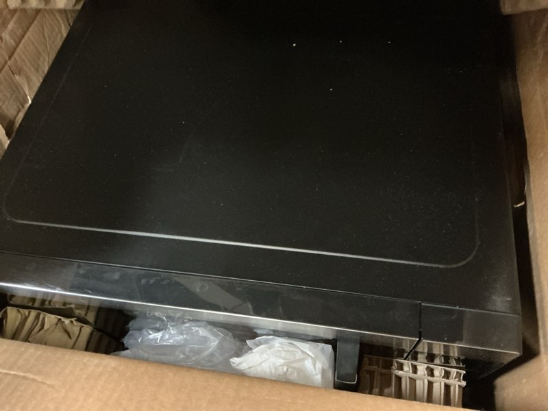 Condition photo showing As Is for hamilton beach 1.6 cu ft sensor cook countertop microwave oven in stainless steel, new