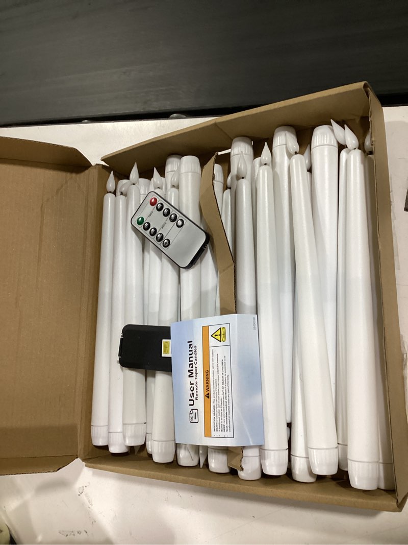 Condition photo showing New/Like New for homemory 11 inches white led taper candles, 24 pcs flameless taper candles with remote timer dimmer, plastic battery operated candlesticks with flickering flame for halloween christmas wedding party white 24