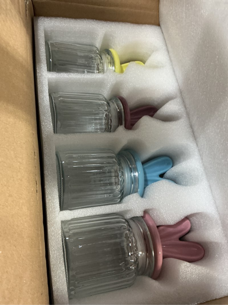 Condition photo showing New/Like New for easter decorations - 4 pack glass candy jars with ceramic bunny ear lids, easter bunny table decor for chocolate mini eggs sweets - 250ml pastel colored jars