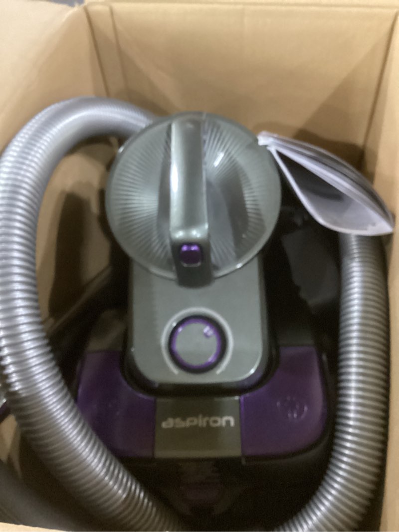 Condition photo showing As Is for not tested aspiron 1700w canister vacuum cleaner, 45kpa bagless vacuum cleaner, multi-cyclonic filtration, 2 anti-allergen hepa filters, 3.5qt dust cup, 4 tools, corded vacuum for hard floor, pet hair, purple