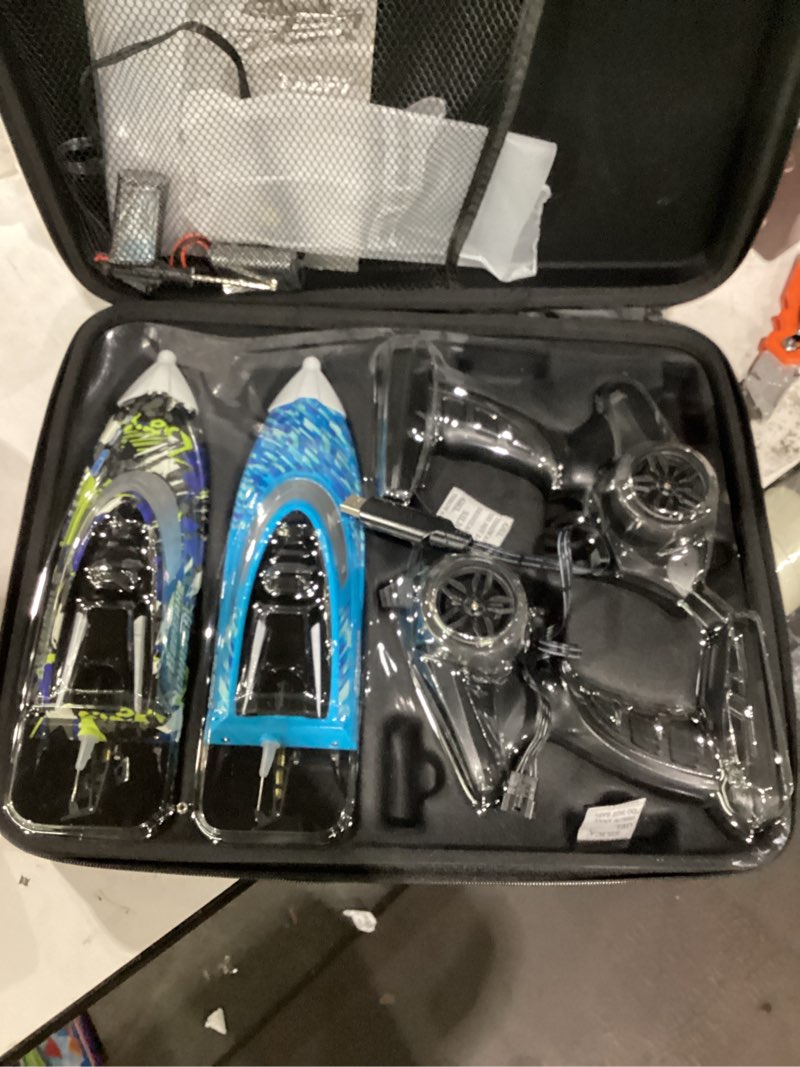 Condition photo showing As Is for bezgar rc boat, 2 packs 12 inch fast speed rc boat 30 kph with a portable suitcase for lakes & pools & salt water, summer toys for adults and ideal gifts for kids boys age 6 7 8-12 years old - tx2p1 blue