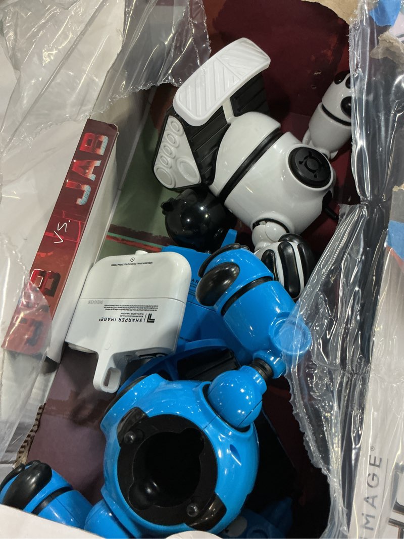 Condition photo showing As Is for sharper image® mecha rivals remote control battle robots, two-player wireless fighting set with lights and sounds blue and white