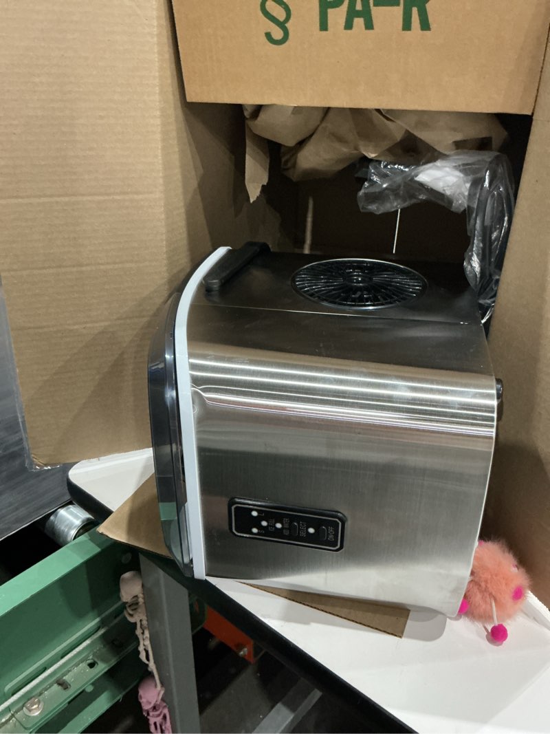 Condition photo showing Good Condition for color is silver euhomy countertop ice maker machine with handle, 26lbs in 24hrs, 9 ice cubes ready in 6 mins, auto-cleaning portable ice maker with basket and scoop, for home/kitchen/camping/rv. (black) black 26lbs
