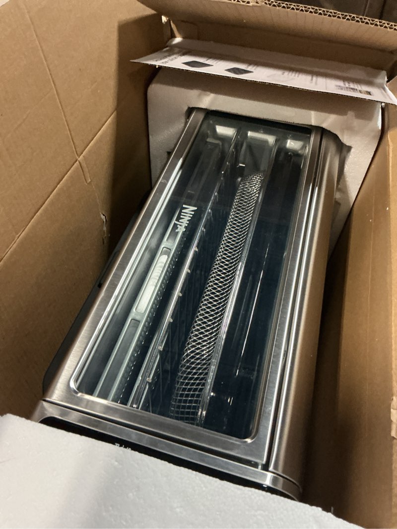 Condition photo showing Good Condition for Ninja Digital Air Fry Countertop Oven, 8-in-1 Functionality, 1800W, Flip-Up Design, XL Capacity, Air Fry Basket, Wire Rack & Crumb Tray, Silver, SP101 8-in-1 Flip Oven