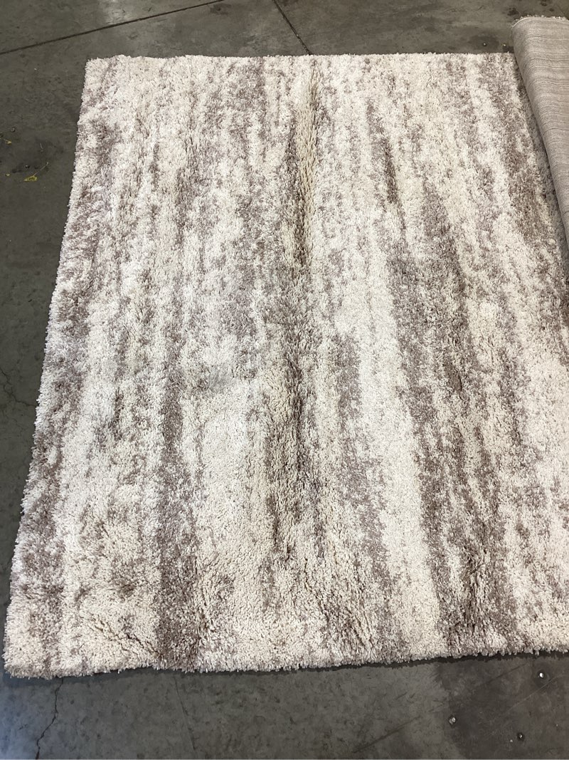 Condition photo showing As Is for SAFAVIEH Hudson Shag Collection SGH206B Ivory / Beige Rug