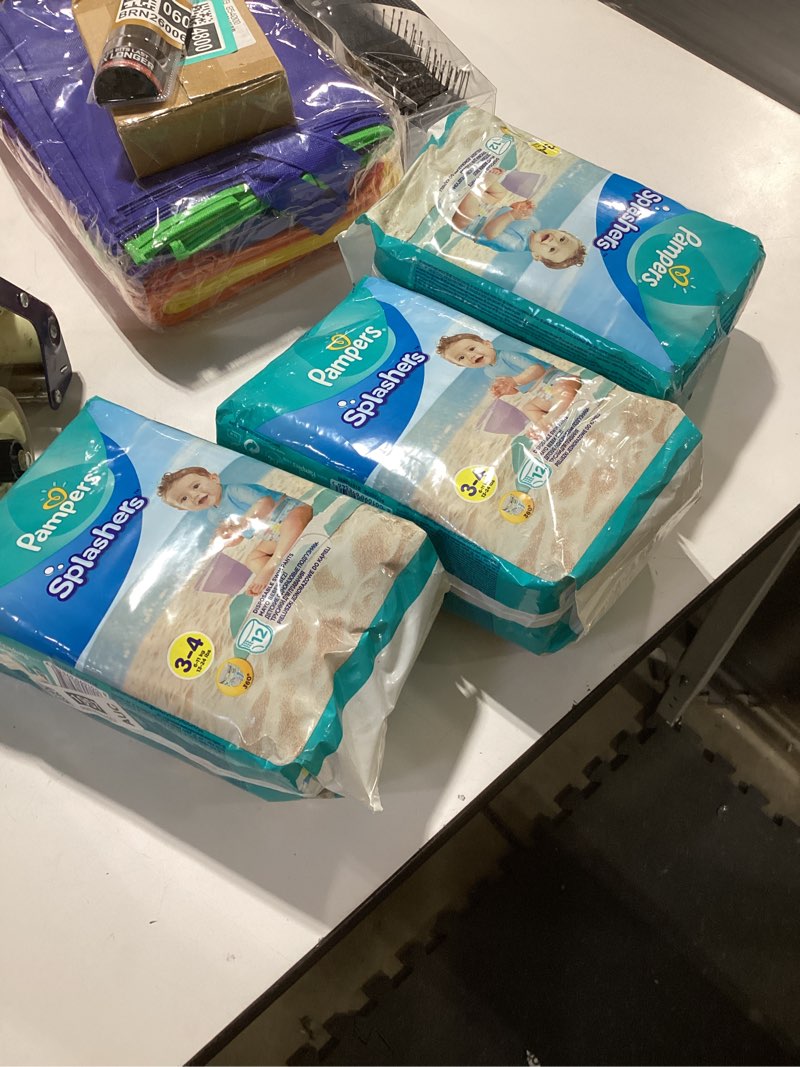 Condition photo showing Good Condition for 3 pack pampers splashers swim pants size 3 12 pack