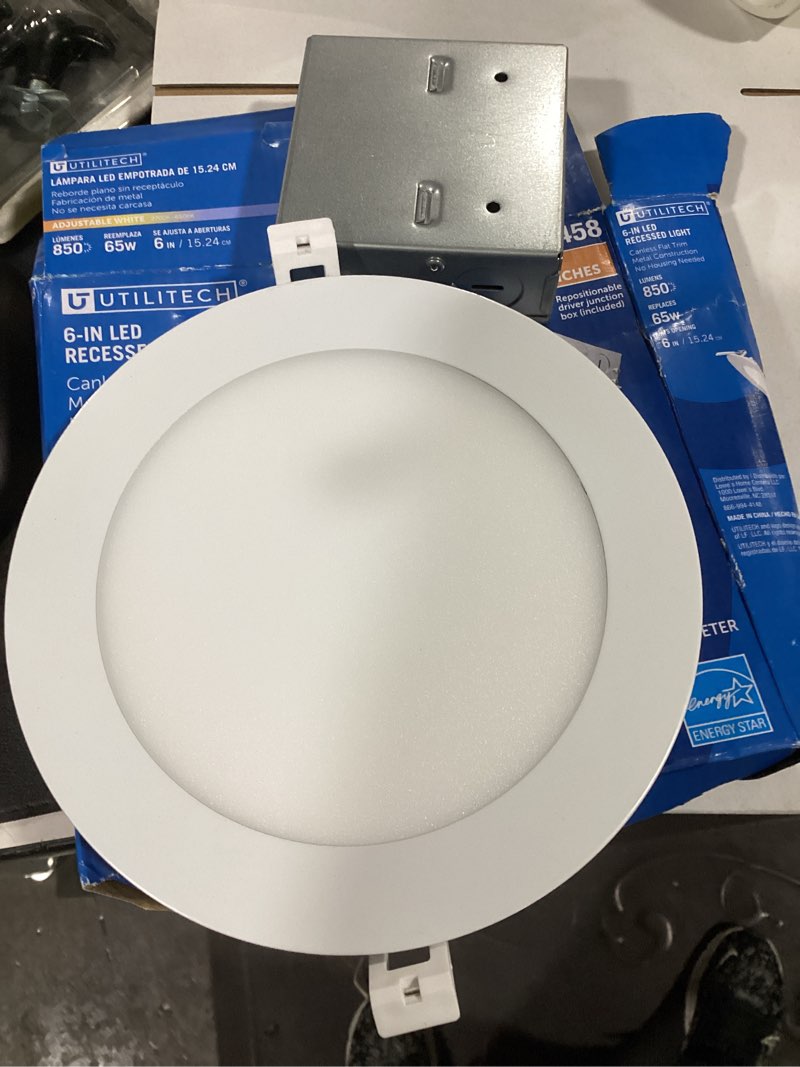 Condition photo showing As Is for utilitech white 6-in 850 -lumens switchable white round dimmable led canless wet rated recessed downlight
