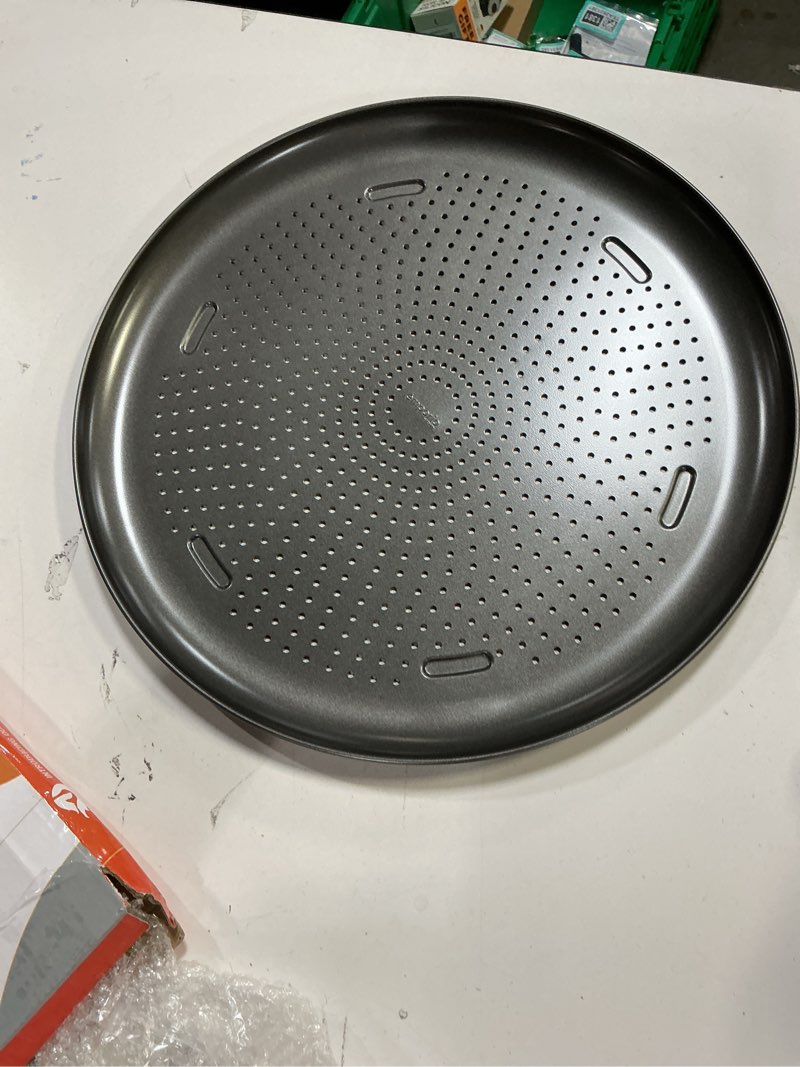 Condition photo showing New/Like New for Pizza Baking Pan - 15.75-Inch Round Perforated Carbon Steel Tray with Non-Stick Coating, Dishwasher Safe, Oven Safe (Up To 450° F), Airflow Design, PFOA, PFOS, PTFE Free, Gray Gray 1 Pack