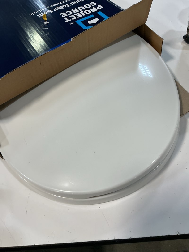 Condition photo showing As Is for project source plastic white round soft close toilet seat
