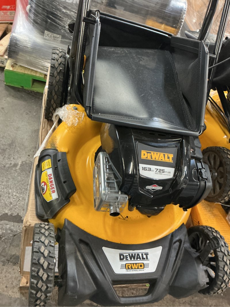 Condition photo showing As Is for dewalt 21" high wheel 3-in-1 gas self-propelled rwd lawn mower
