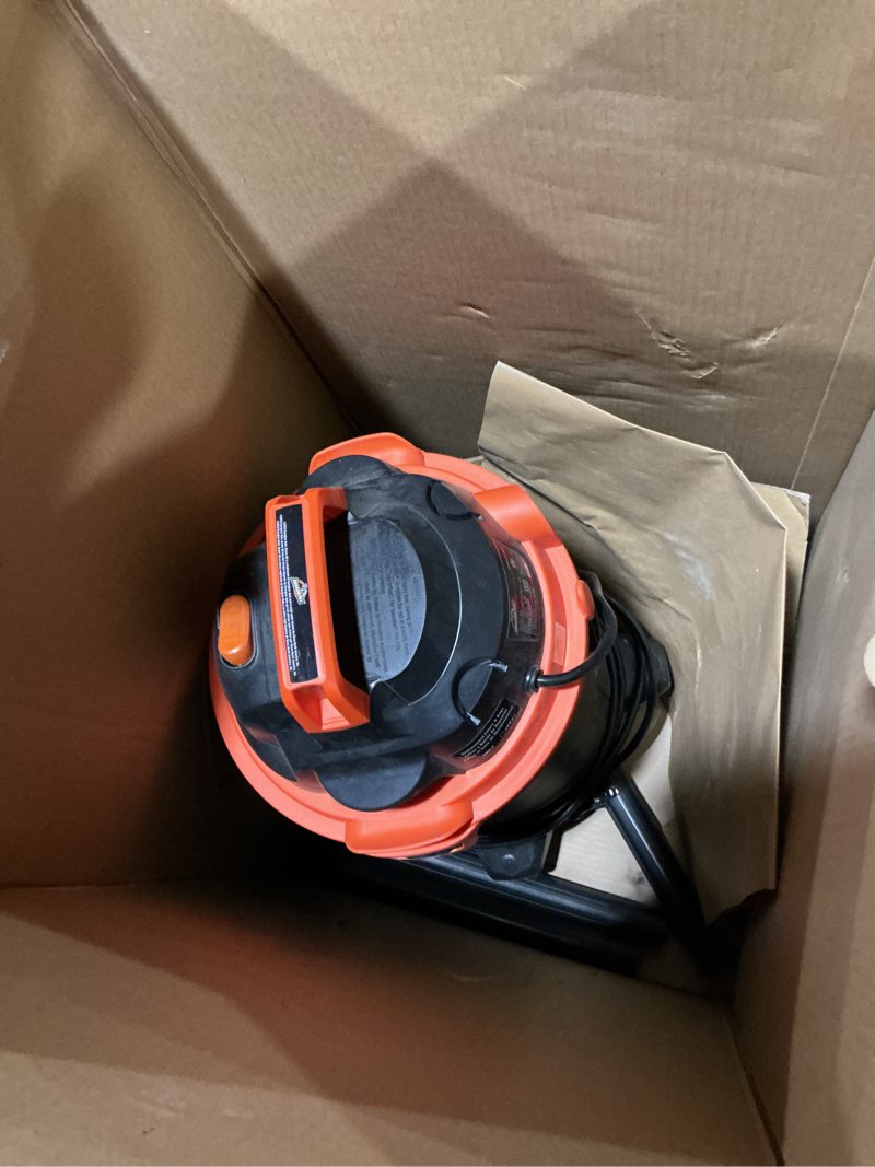 Condition photo showing As Is for armor all vo405p 0901 4 gallon wet/dry vac 2.0 peak hp shop vacuum with nozzles & brush,black/orange 4 gal vac