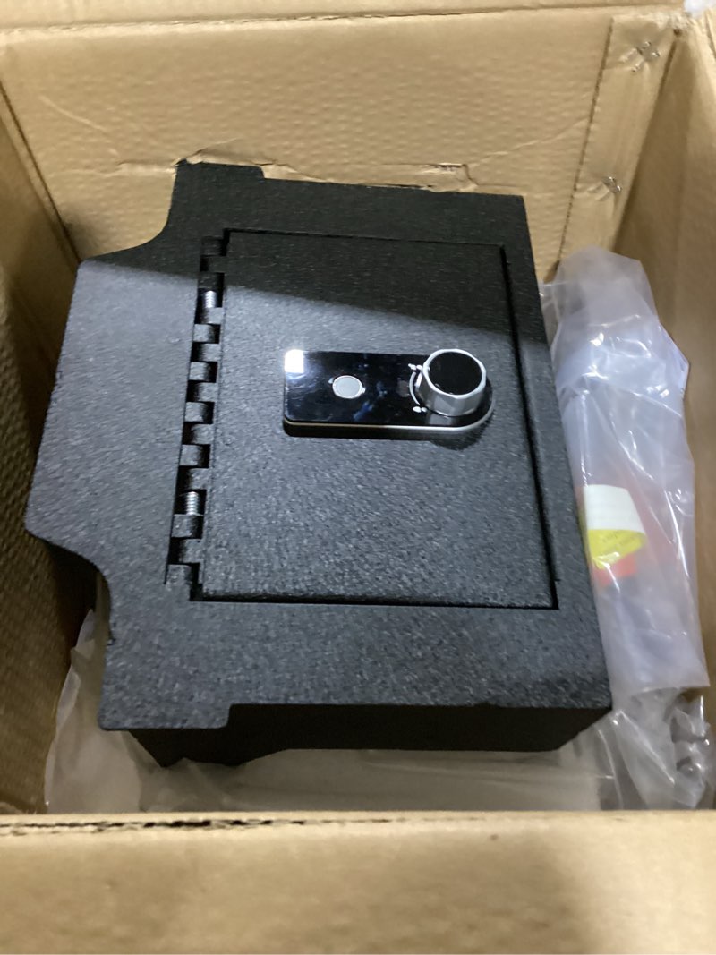 Condition photo showing Good Condition for center console safe gun safe, wasai console gun vault lock box compatible with ram 1500/2500/3500 laramie/bighorn/powerwagon 2019-2026, 4-digit lock with backup key. 4-digit combination lock with backup key
