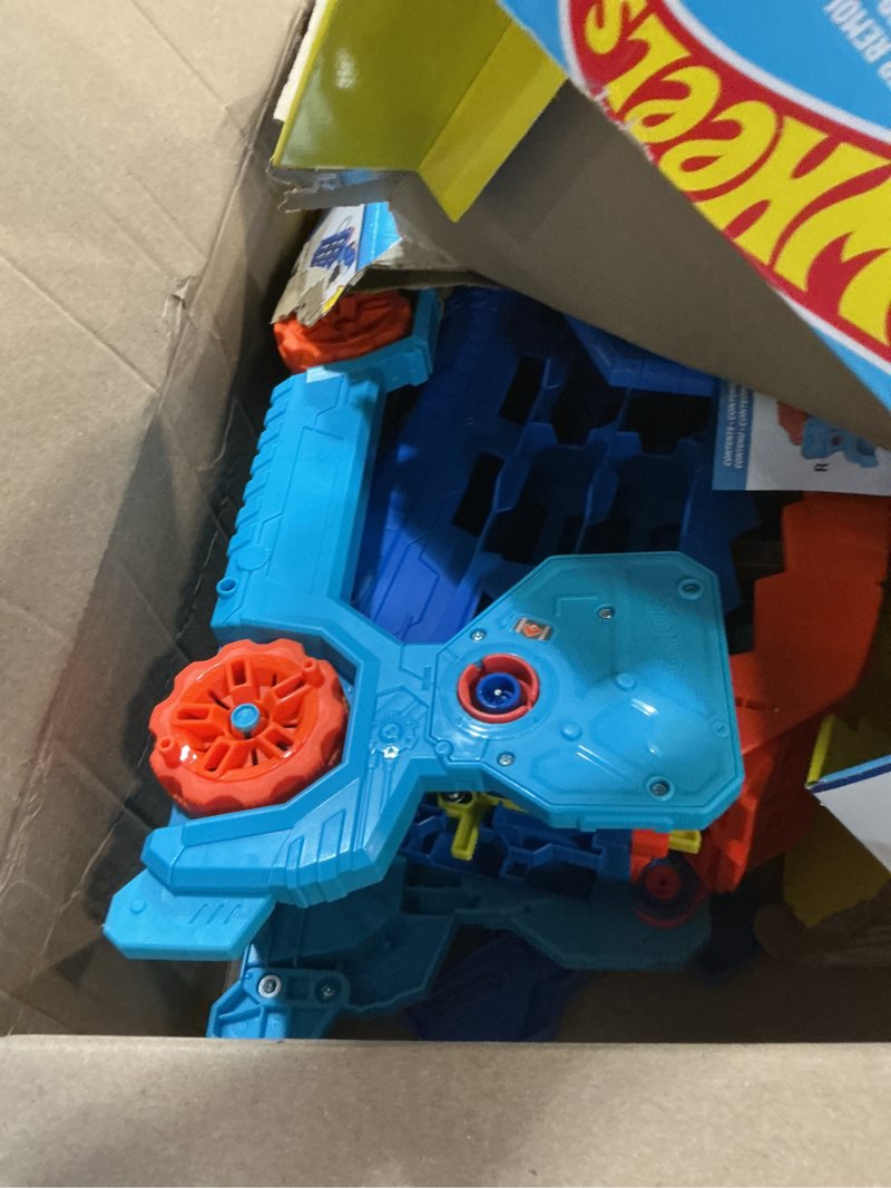 Condition photo showing As Is for Hot Wheels City Toy Car Track Set, Ultimate T-Rex Transporter, Hauler Transforms into Stomping Dino with Race Track, from Netflix Series “Let’s Race”