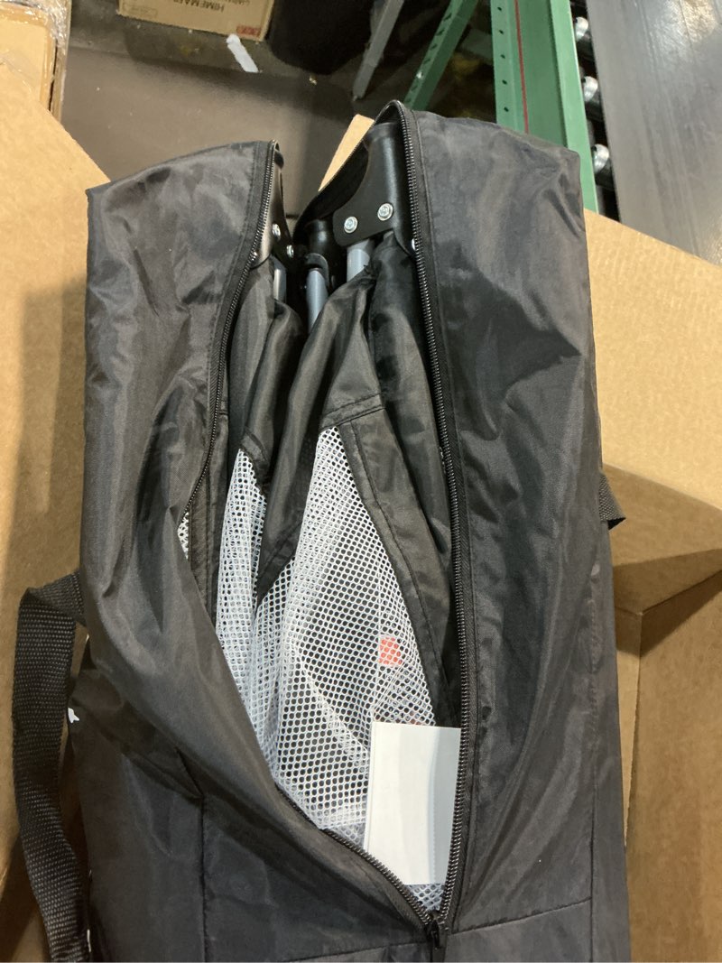 Condition photo showing Good Condition for dream on me nest portable playard in black with carrybag an shoulder strap, lightweight, packable and easy setup baby playard, breathable mesh sides and soft fabric - comes with a removable padded mat