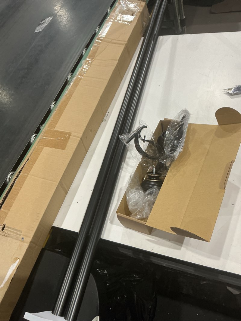 Condition photo showing Good Condition for decopolitan 27865-36blk urn single rod set, 36 to 72-inch, antique black antique black 36 to 72-inch curtain rod